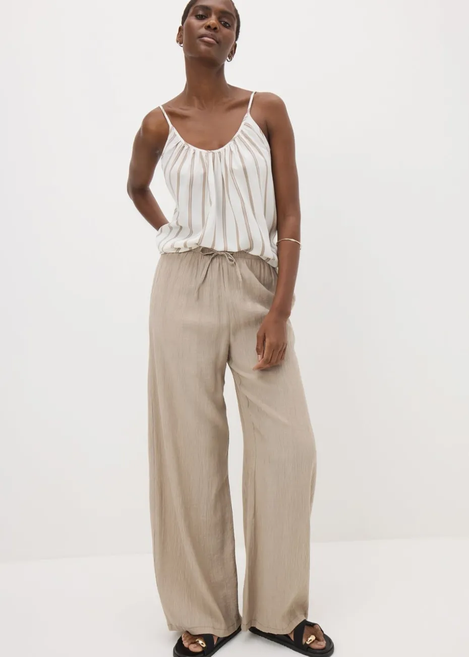 Beige Textured Wide Leg Trousers