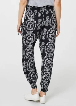 Izabel London Black Printed Smocked Waist Harem Pants