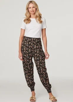 Izabel London Black Printed Relaxed Tapered Harem Pants