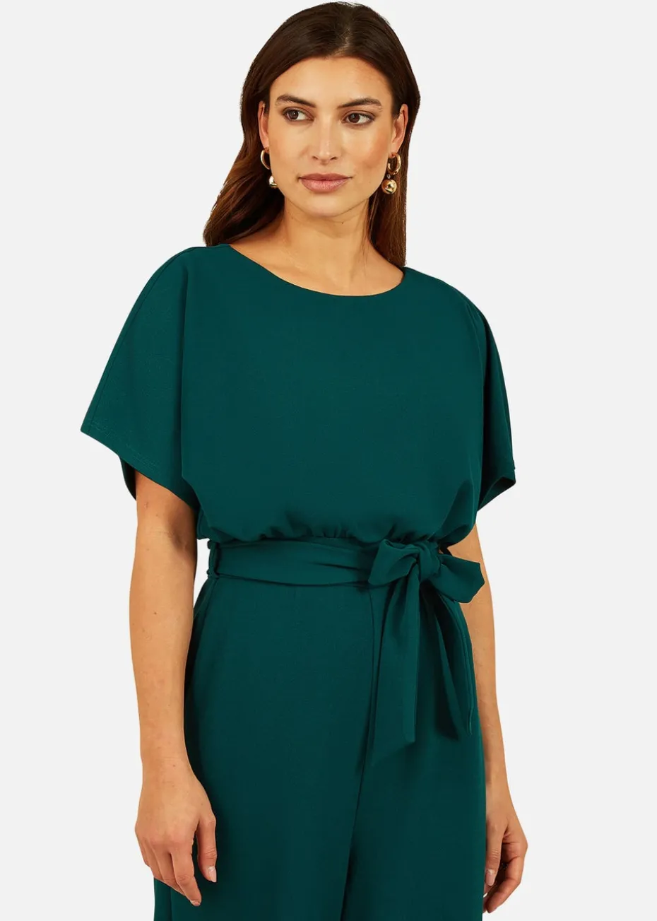 Mela Batwing Stretch Jumpsuit in Green