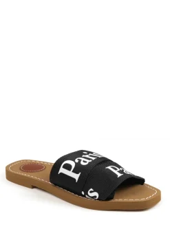 Where's That From Black Pu Cobra Flat Sandals