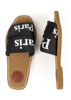 Where's That From Black Pu Cobra Flat Sandals