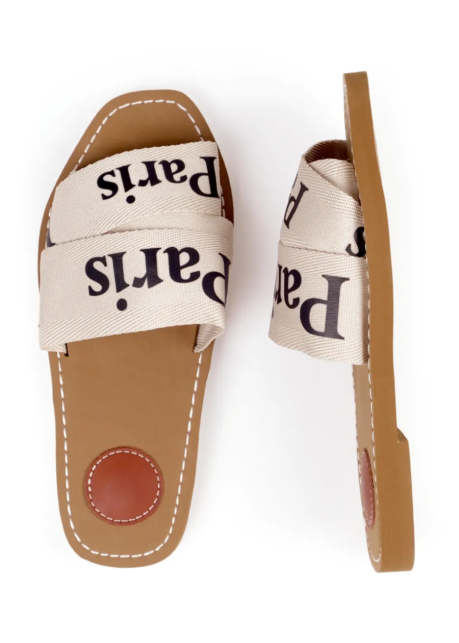 Where's That From Cream Pu Cobra Flat Sandals