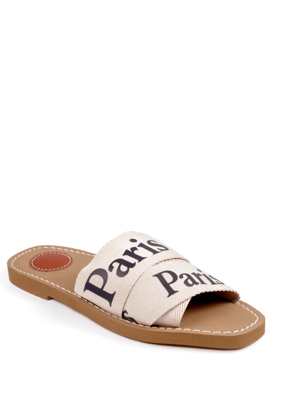 Where's That From Cream Pu Cobra Flat Sandals