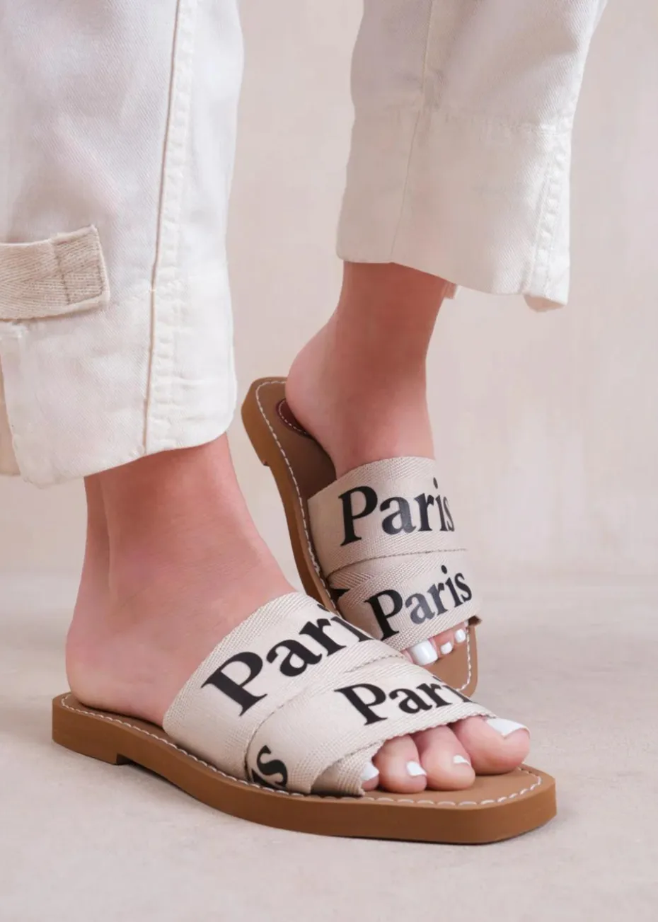 Where's That From Cream Pu Cobra Flat Sandals