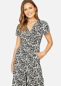 Yumi Black And White Wrap Over Stretch Jumpsuit