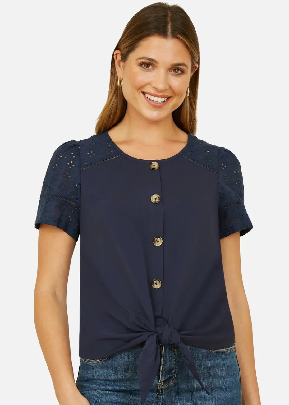 Yumi Navy Jersey Button Detail T-Shirt With Broderie Anglaise Sleeves And Tie Front